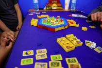 People play Settlers of Catan at Meeplevile Board Game Cafe on Thursday, March 20, 2025, in Las ...