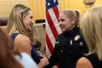 Police chief Hollie Chadwick greets friends and supporters after her swearing-in ceremony at He ...