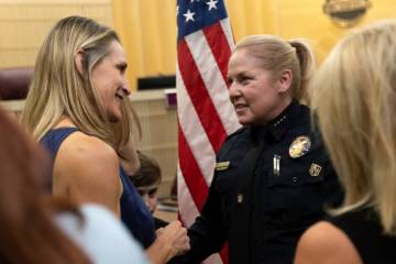 Police chief Hollie Chadwick greets friends and supporters after her swearing-in ceremony at He ...