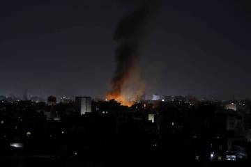 Smoke rises from a location reportedly struck by U.S. airstrikes in Sanaa, Yemen, Wednesday, Ma ...
