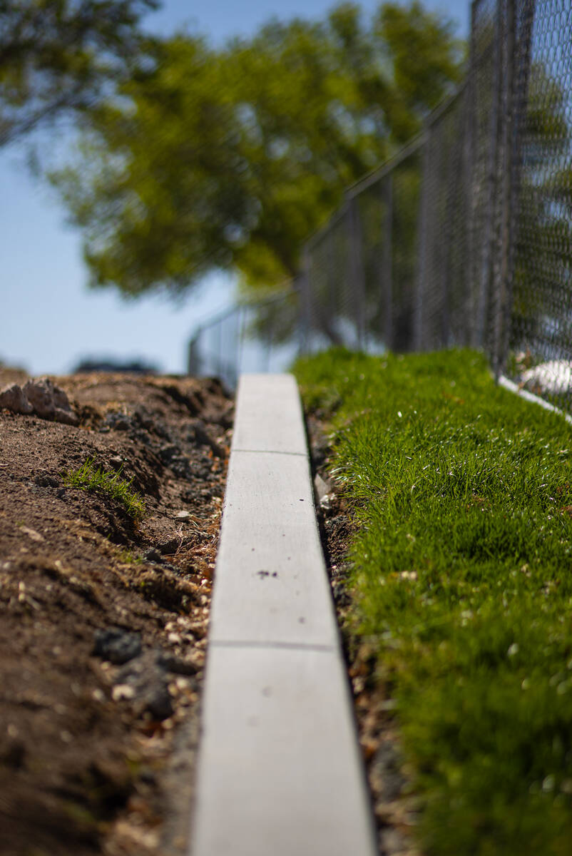 Dirt where grass previously was is seen at Mission Hills Park on Wednesday, March 19, 2025, in ...