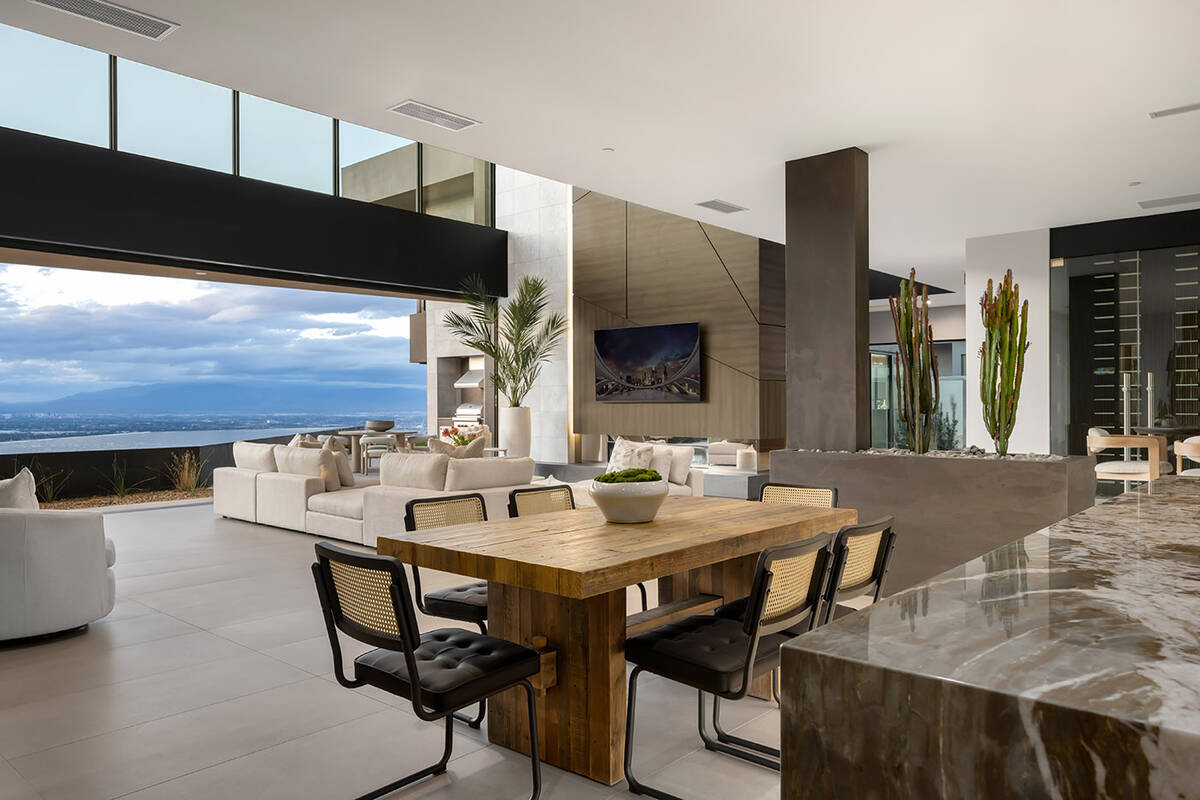 The Ascaya homes feature disappearing walls that showcase sweeping views of the Las Vegas Valle ...