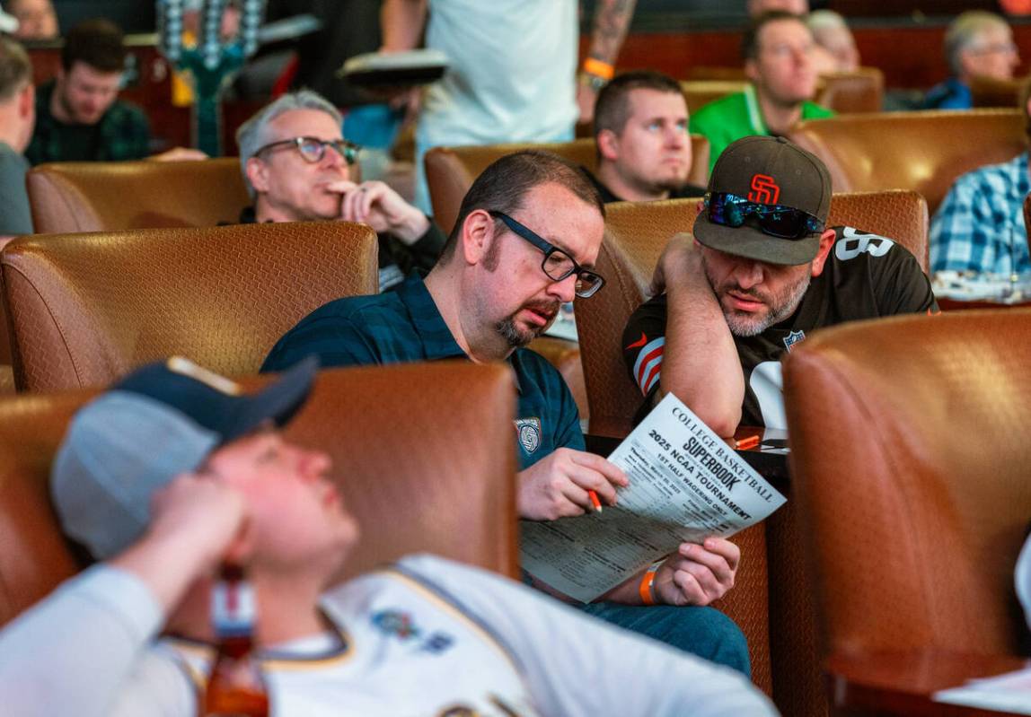 Bettors talk match ups while relaxing in comfy loungers as during first day of NCAA Tournament, ...
