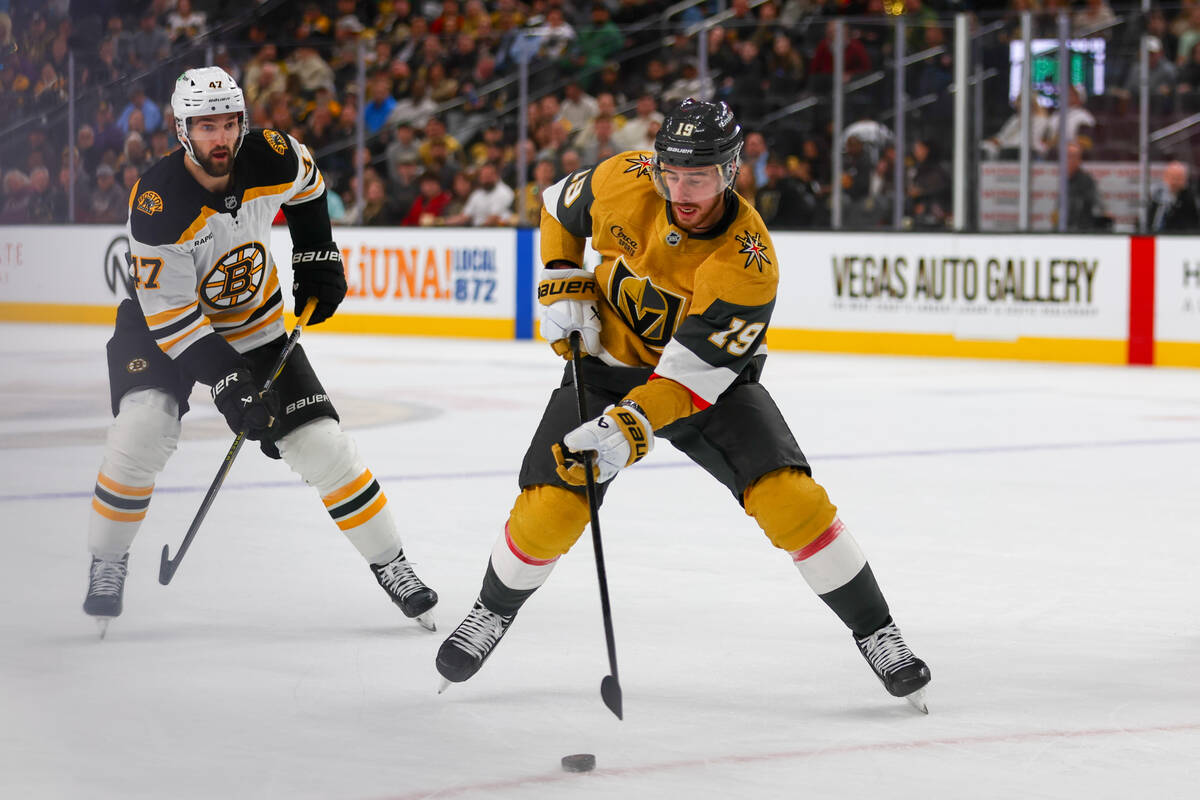 Golden Knights right wing Reilly Smith (19) skates with the puck against Boston Bruins center M ...