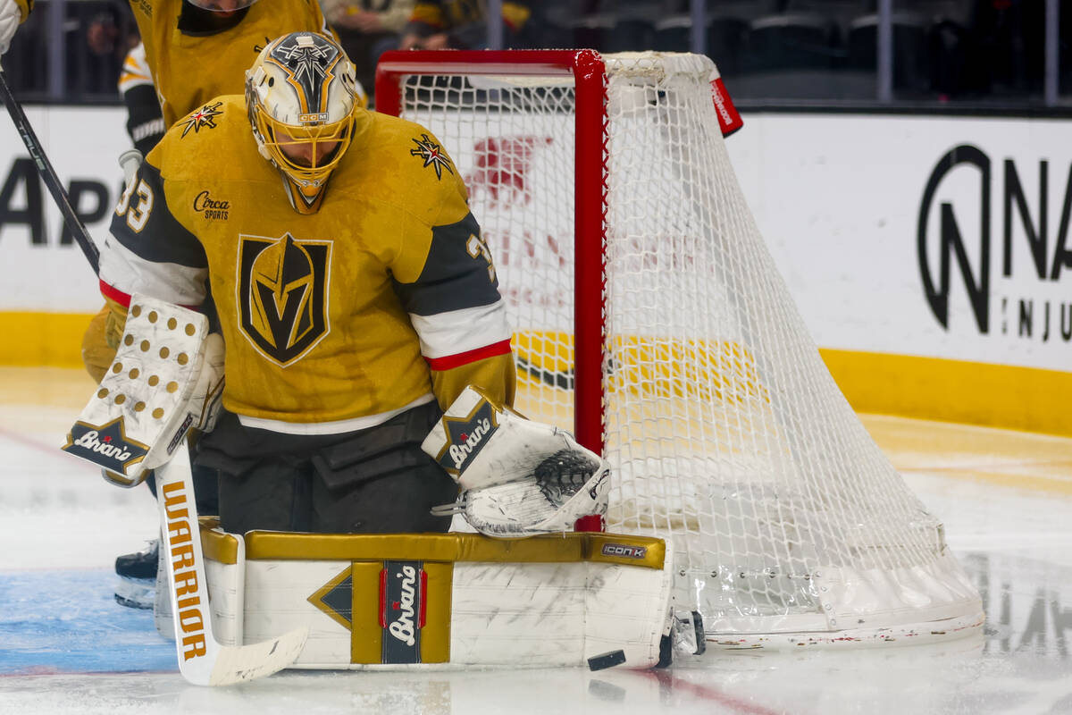 Golden Knights goaltender Adin Hill (33) blocks a shot during the second period against the Bos ...