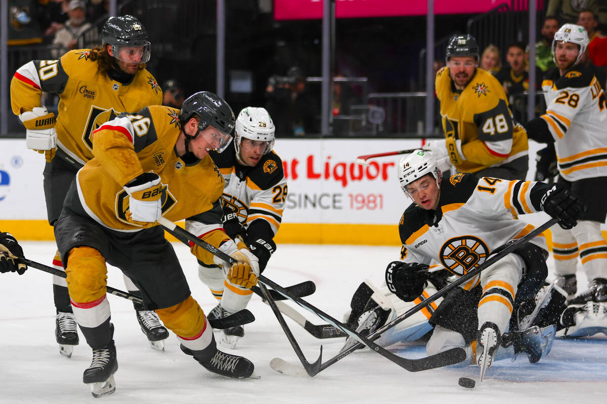 Golden Knights left wing Pavel Dorofeyev (16) =takes a shot against Boston Bruins defenseman Ia ...