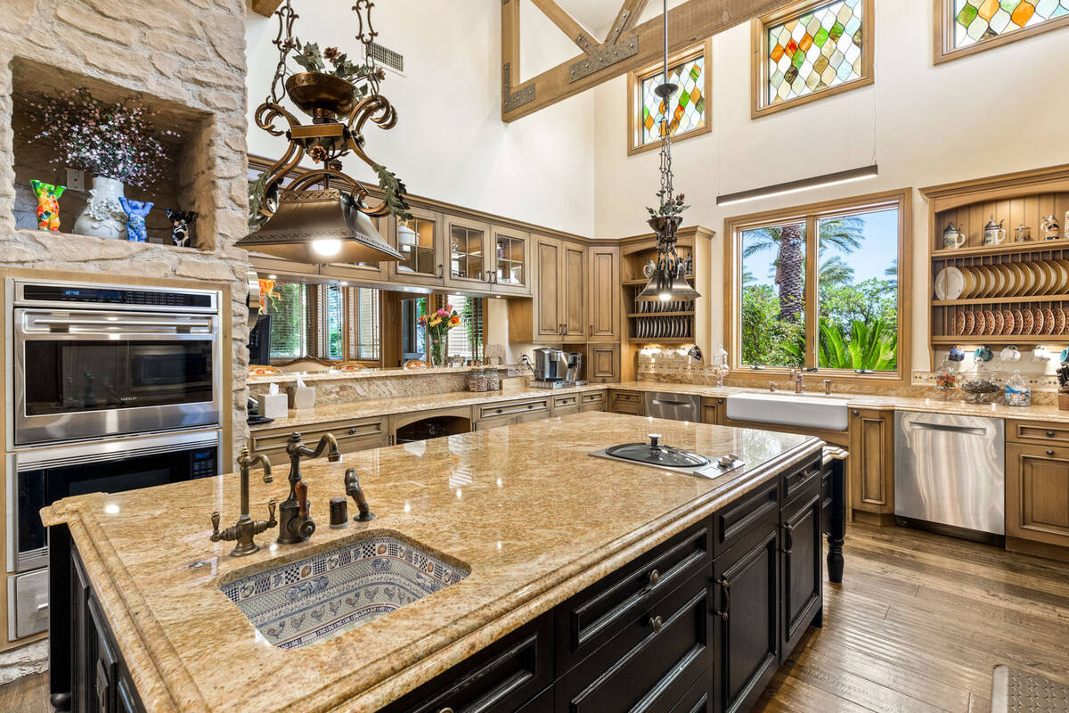 This residence is in one of the most sought-after streets and communities, behind two gates in ...