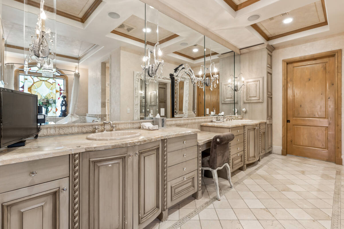 This residence is in one of the most sought-after streets and communities, behind two gates in ...