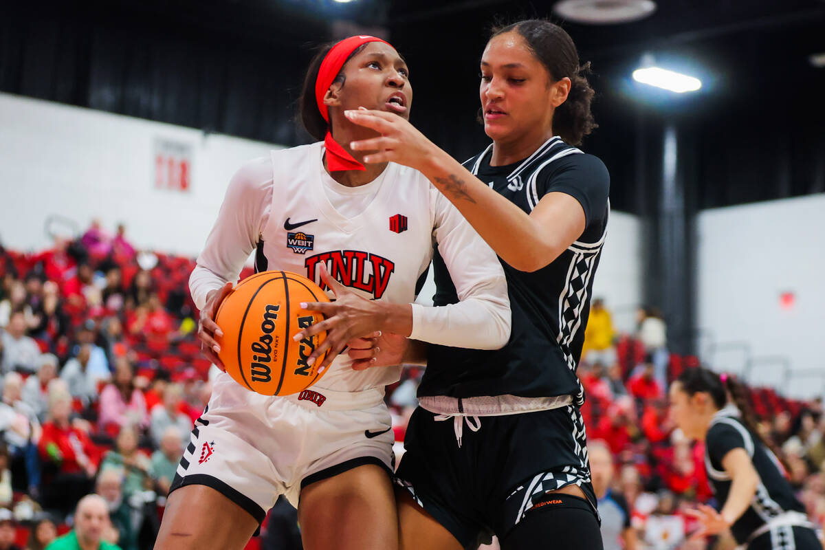 Lady Rebels forward Meadow Roland (32) eyes the basket during a Women's Basketball Invitation T ...