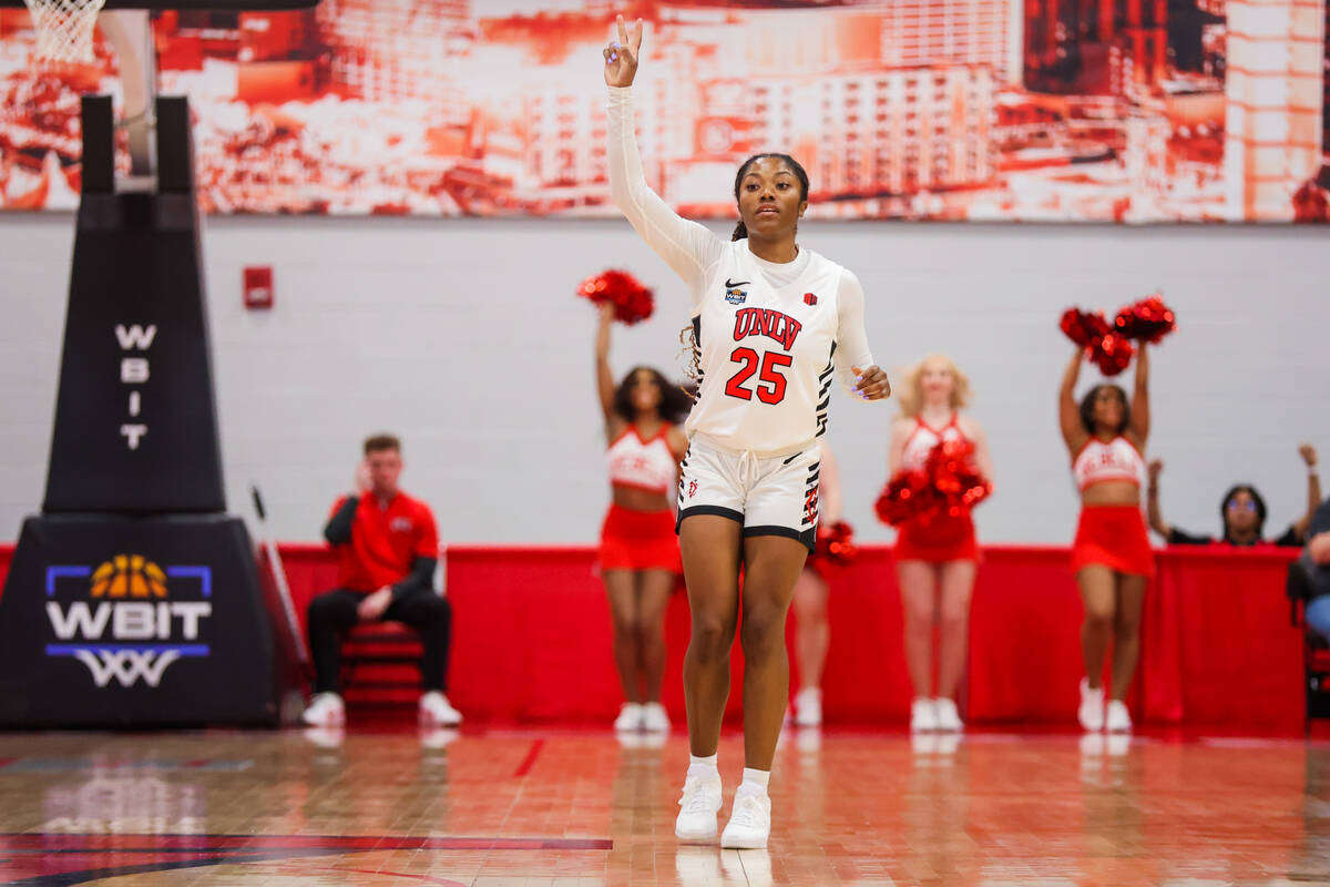Lady Rebels guard Aaliyah Alexander (25) signals to her teammates during a Women's Basketball I ...