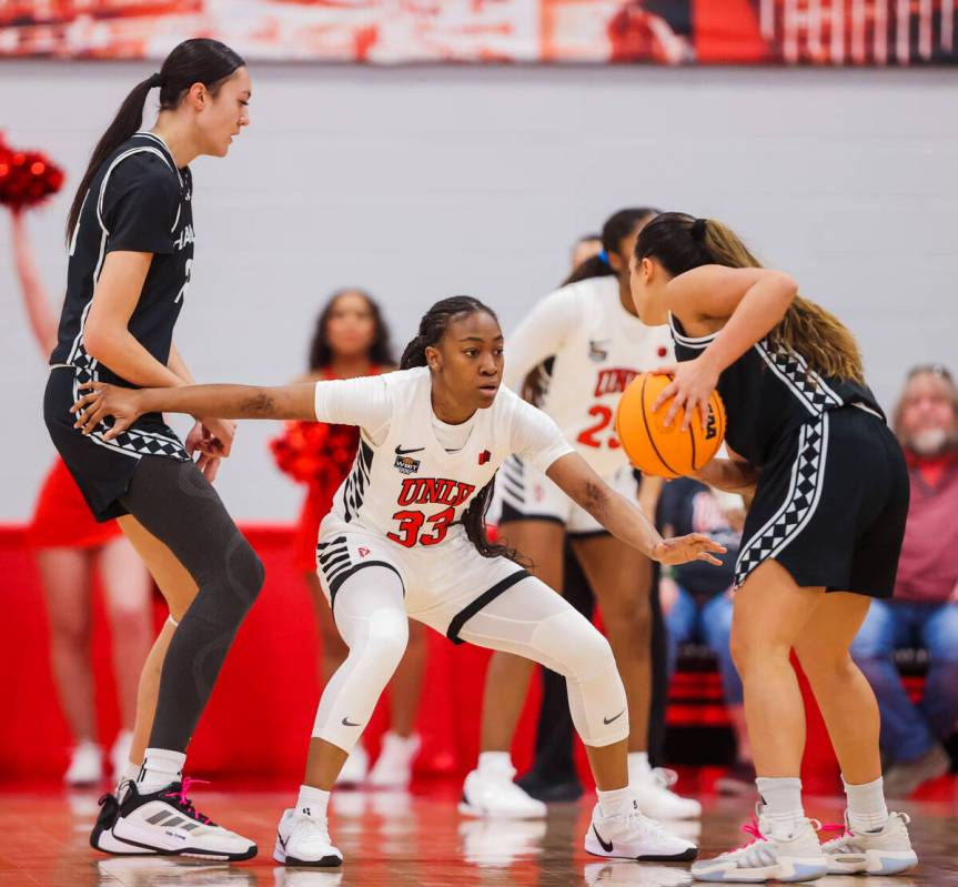 Lady Rebels guard Amarachi Kimpson (33) defends during a Women's Basketball Invitation Tourname ...