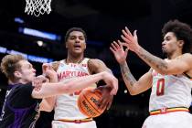 Maryland forward Julian Reese, center, guard Ja'Kobi Gillespie, right, and Grand Canyon forward ...