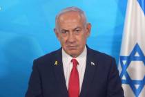 In this image made from a video released by the Israeli Government Press Office, Prime Minister ...