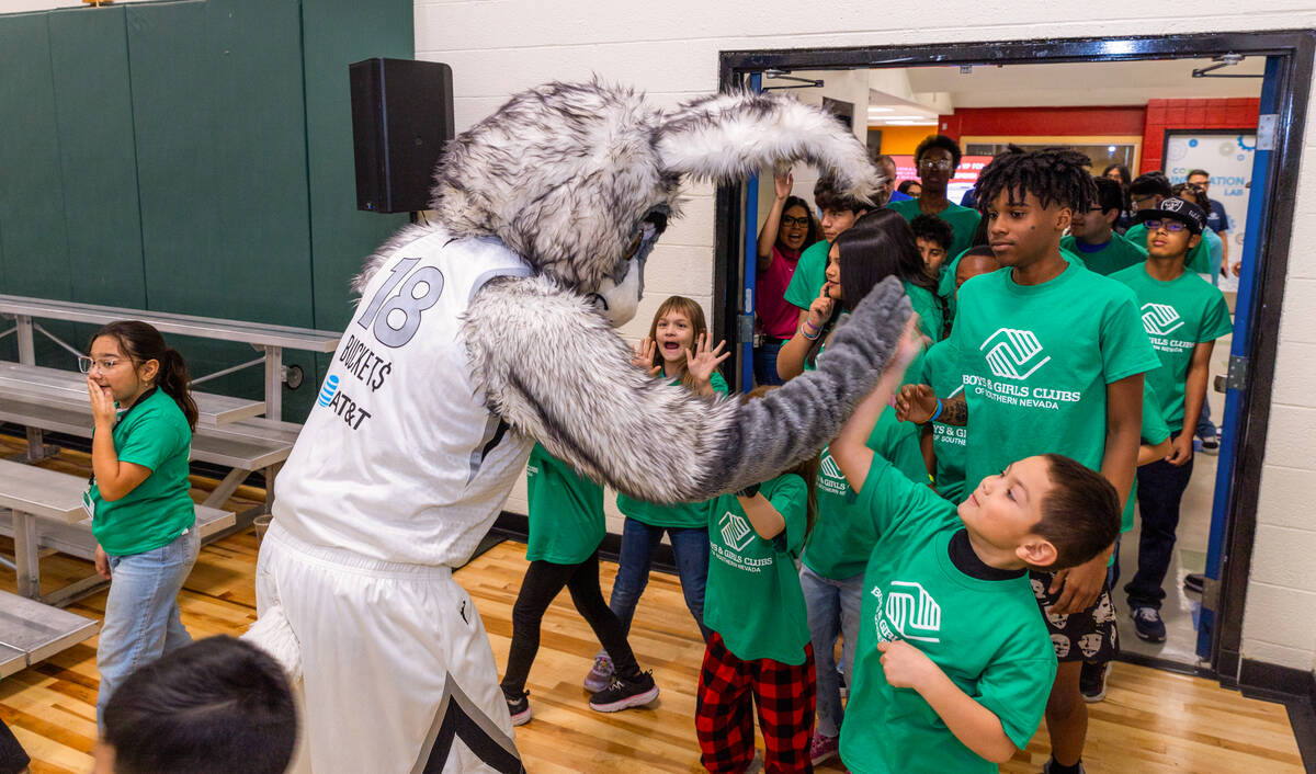 Aces mascot Buckets greets kids while they enter as the A'ja Wilson and 2K Foundations will hel ...