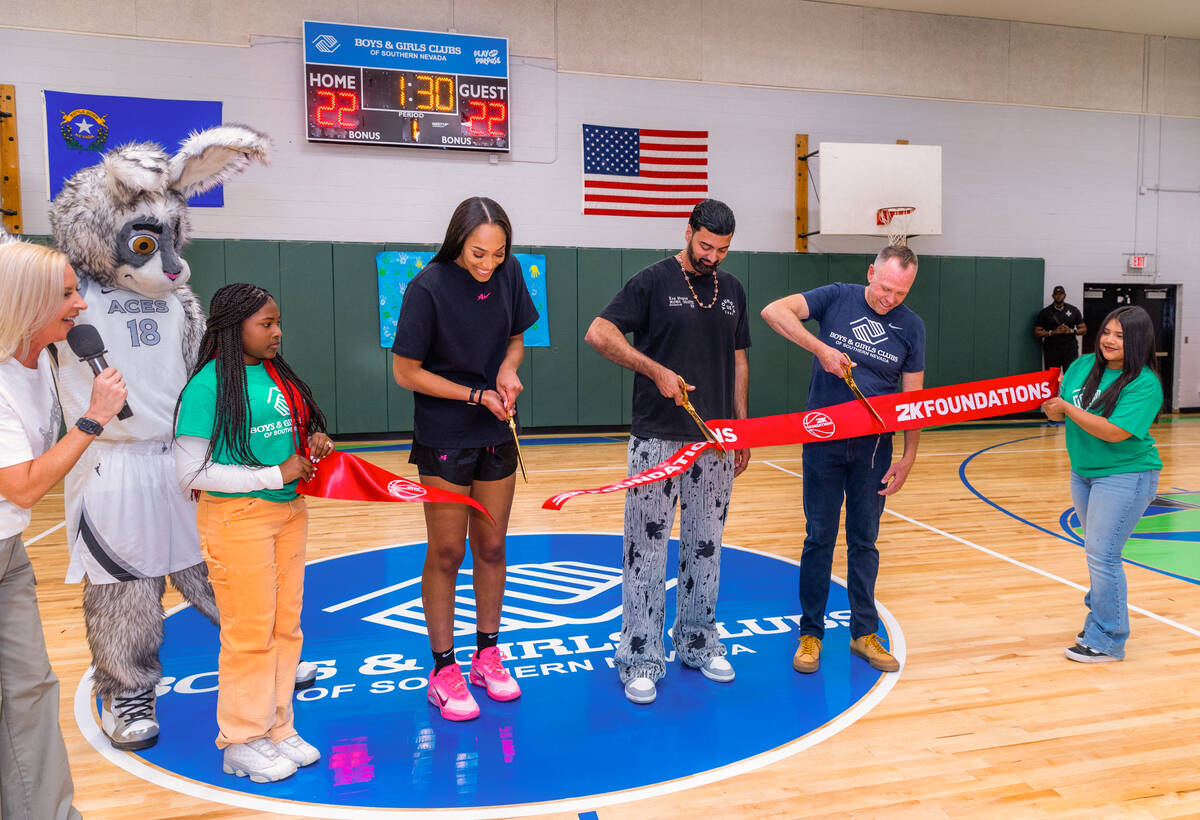 Aces star A'ja Wilson, Ronnie 2K and Andy Bischel, President and CEO of the Boys & Girls Clubs ...