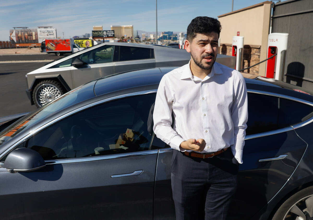 Anthony Buckner speaks during an interview with the Review-Journal as he charges his Tesla Mode ...