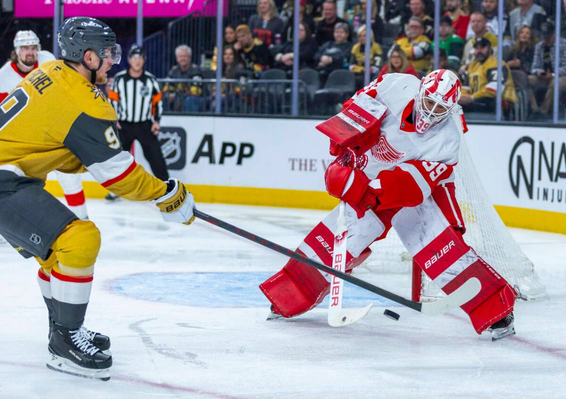 Golden Knights center Jack Eichel (9) takes a shot on goal againstDetroit Red Wings goaltender ...