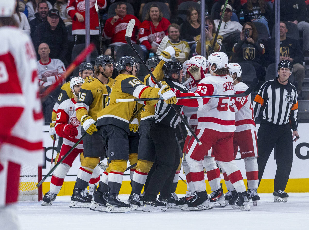 Golden Knights and Detroit Red Wings players fight late during the third period of their NHL ga ...