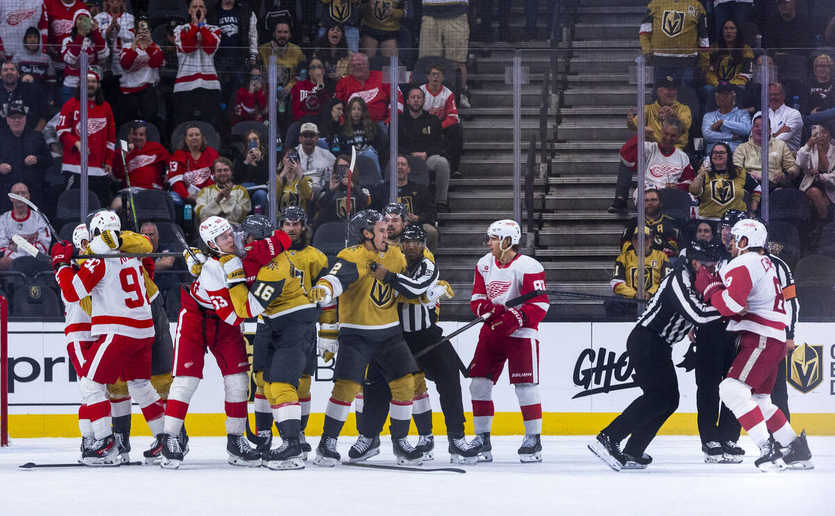 Golden Knights and Detroit Red Wings players fight late during the third period of their NHL ga ...