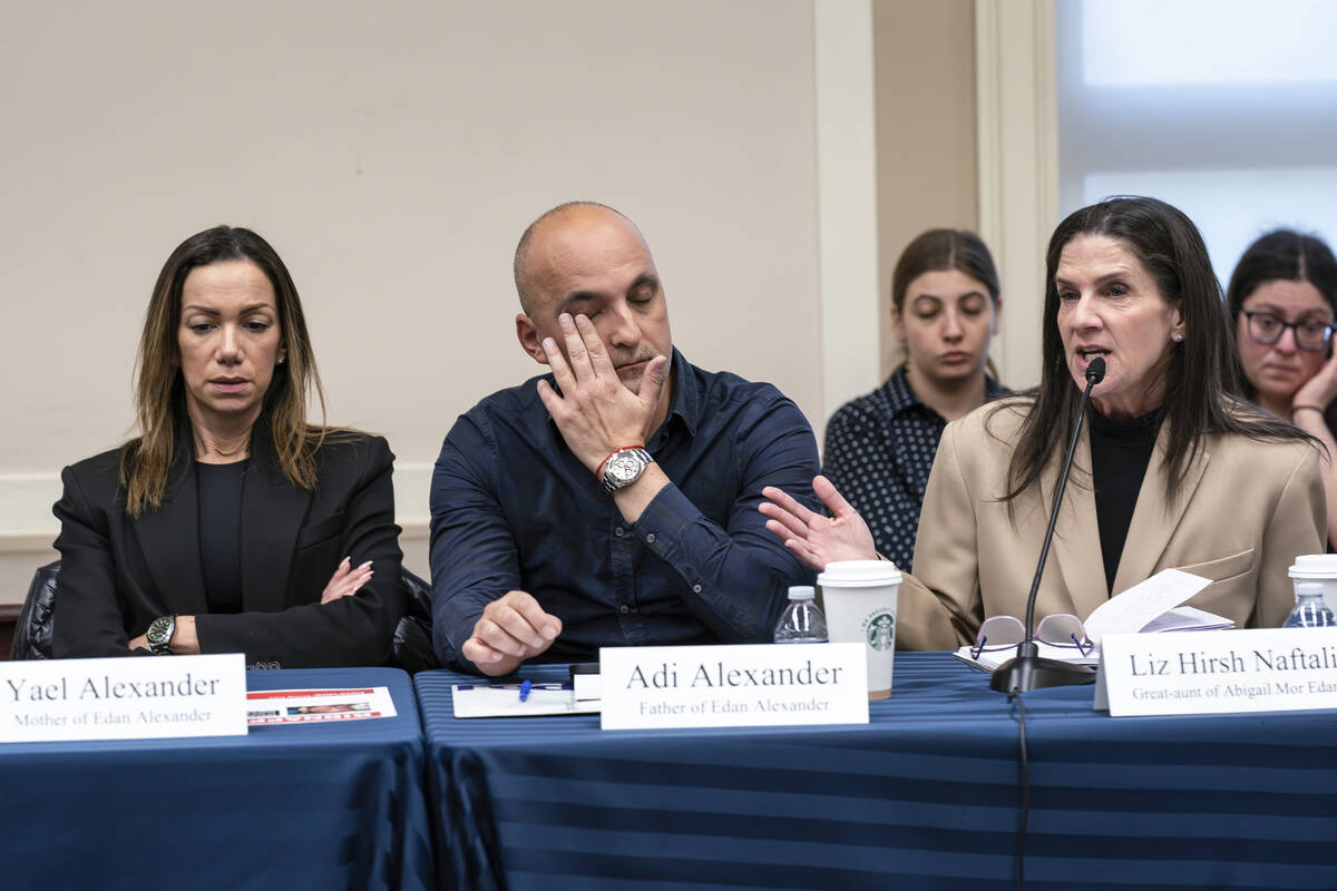 FILE - From left, Yael and Adi Alexander, parents of Eden Alexander, who was abducted and broug ...