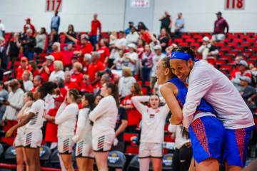 Florida Gators teammates celebrate beating the Lady Rebels on a buzzer beater during a second r ...