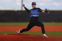 Basic pitcher Lincoln Evans pitches during a high school baseball game between Basic Academy an ...
