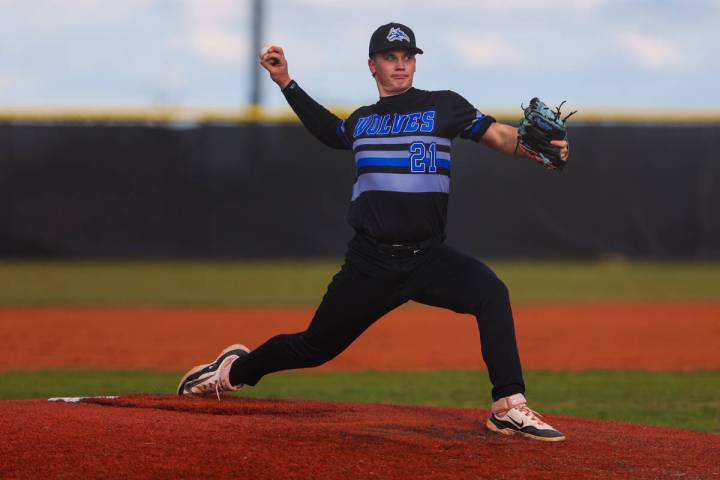 Basic pitcher Lincoln Evans pitches during a high school baseball game between Basic Academy an ...