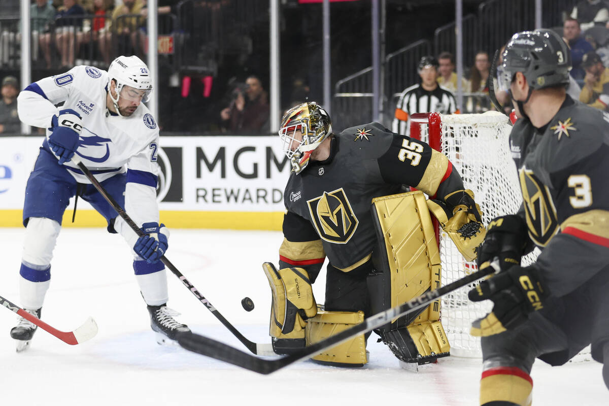 Vegas Golden Knights goaltender Ilya Samsonov (35) stops a shot from Tampa Bay Lightning left w ...