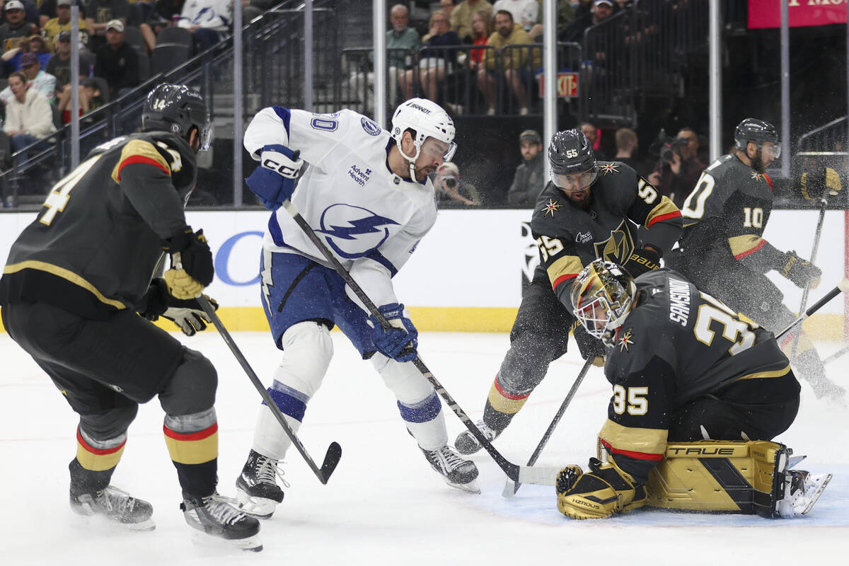 Vegas Golden Knights defenseman Nicolas Hague (14), right wing Keegan Kolesar (55) and goaltend ...