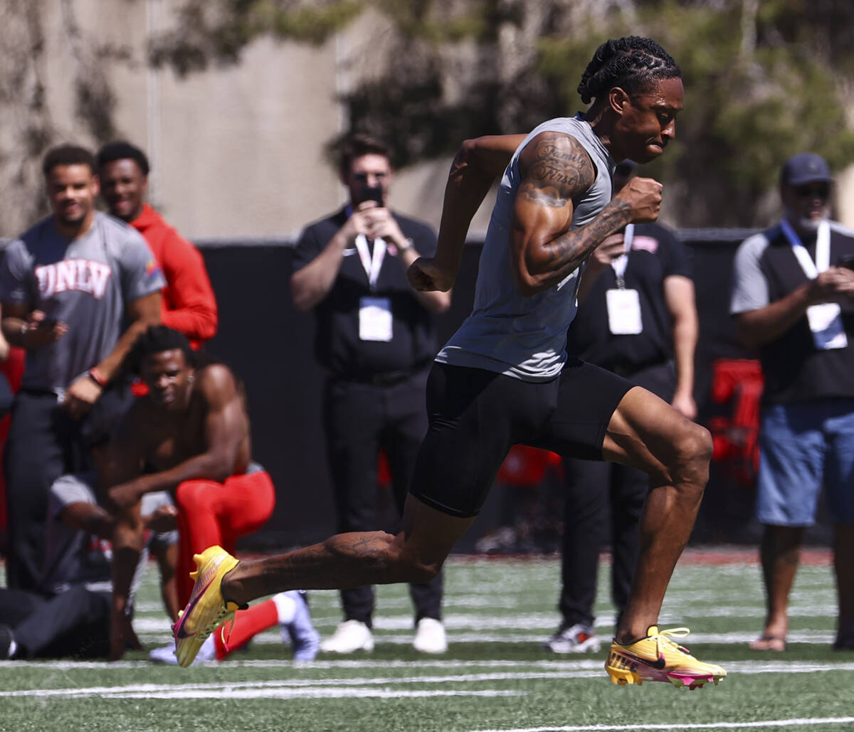 UNLV wide receiver Ricky White III runs the 40-yard dash during UNLV football's Pro Day at the ...