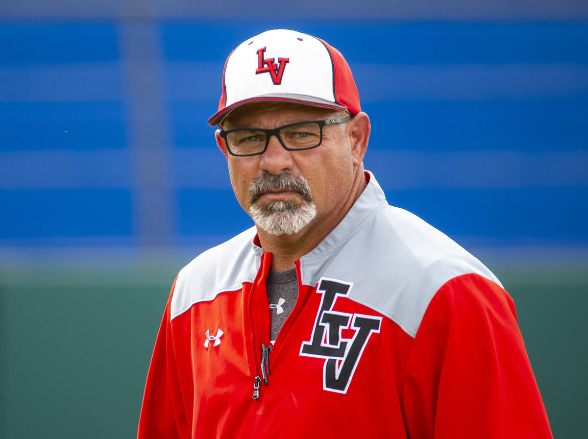 Longtime Las Vegas High coach Sam Thomas eyes his players during their state baseball tournamen ...