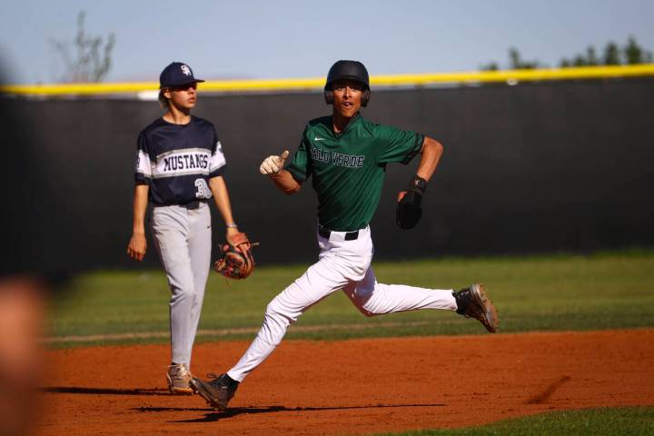 Palo Verde's Keimani Johnson rounds second base against Shadow Ridge during a baseball game at ...