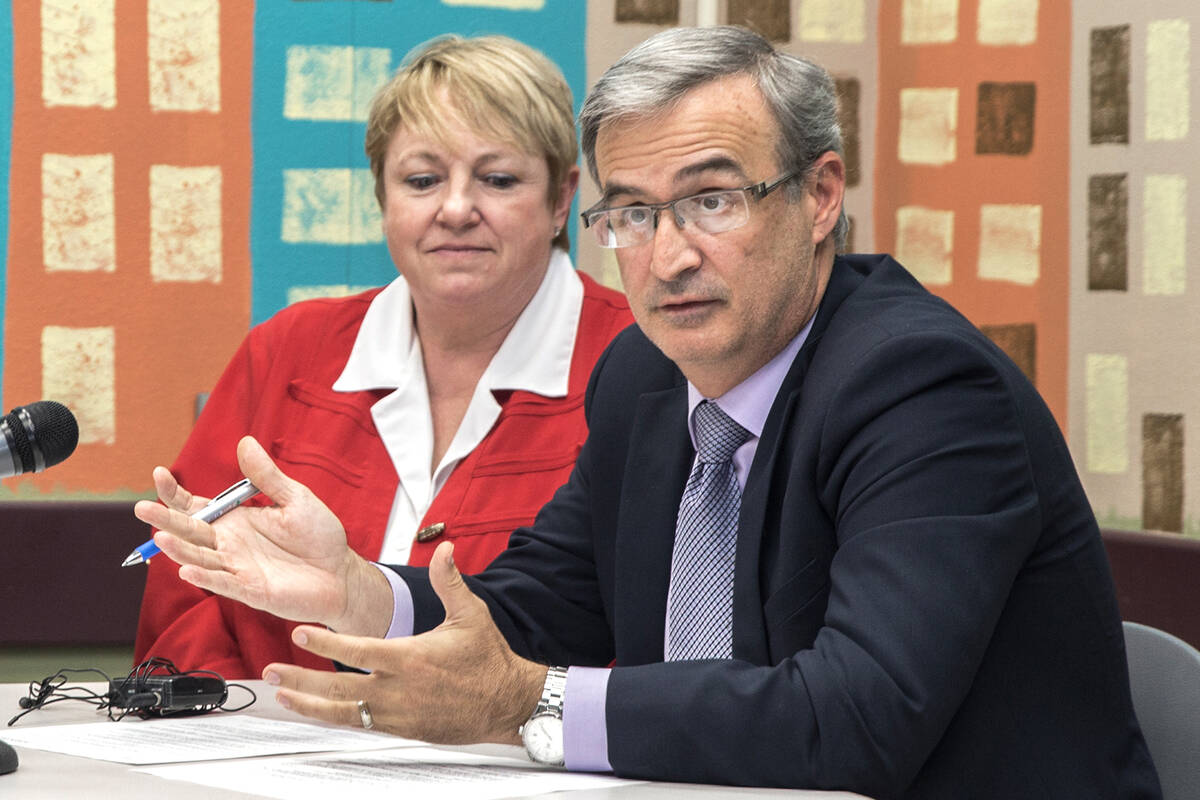 Jason Goudie, right, chief financial officer for Clark County School District, addresses the me ...