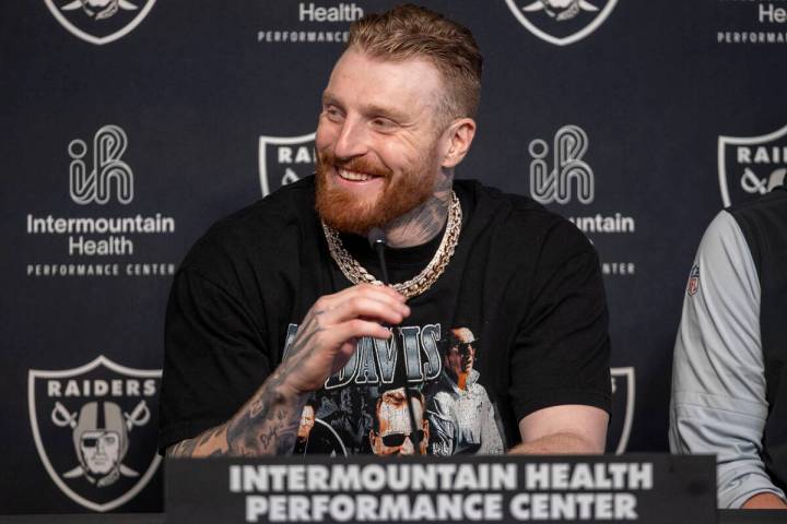 Raiders defensive end Maxx Crosby smiles during a news conference after receiving a contract ex ...