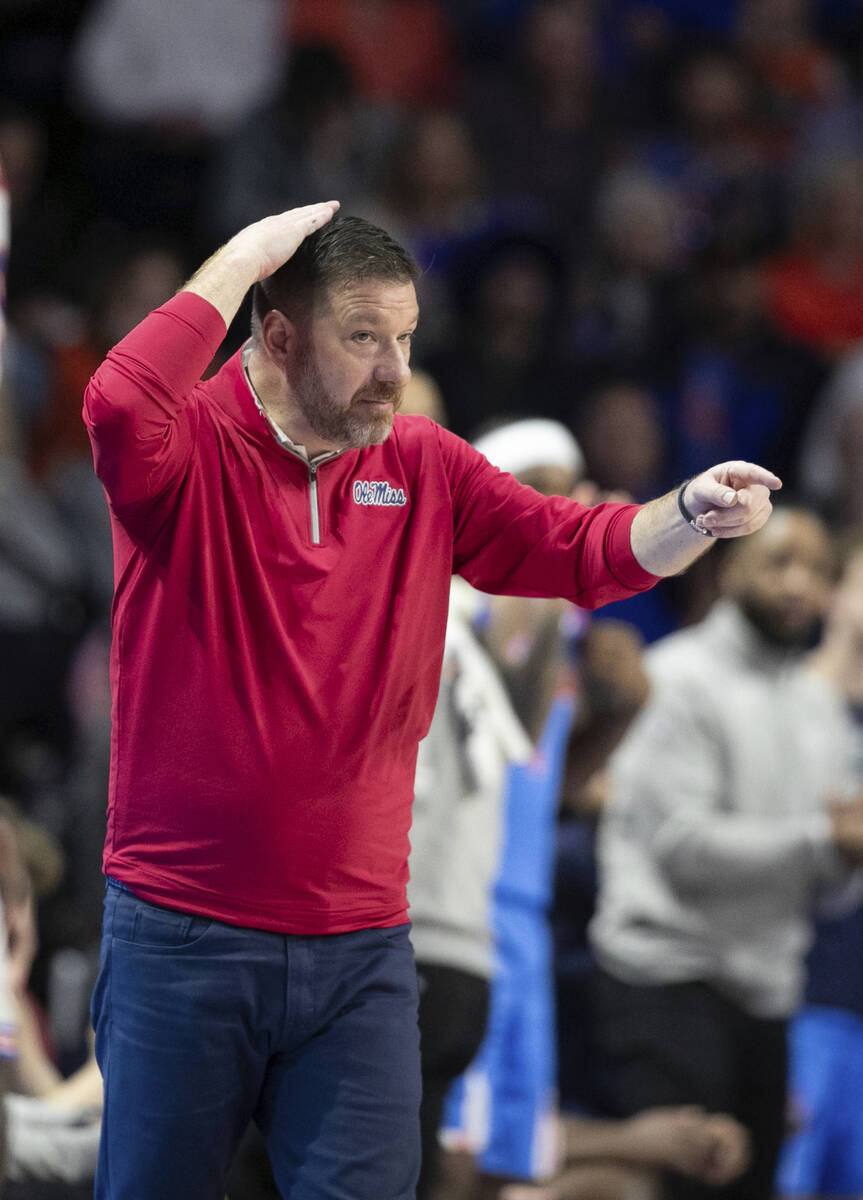 Mississippi head coach Chris Beard reacts during the second half of an NCAA college basketball ...