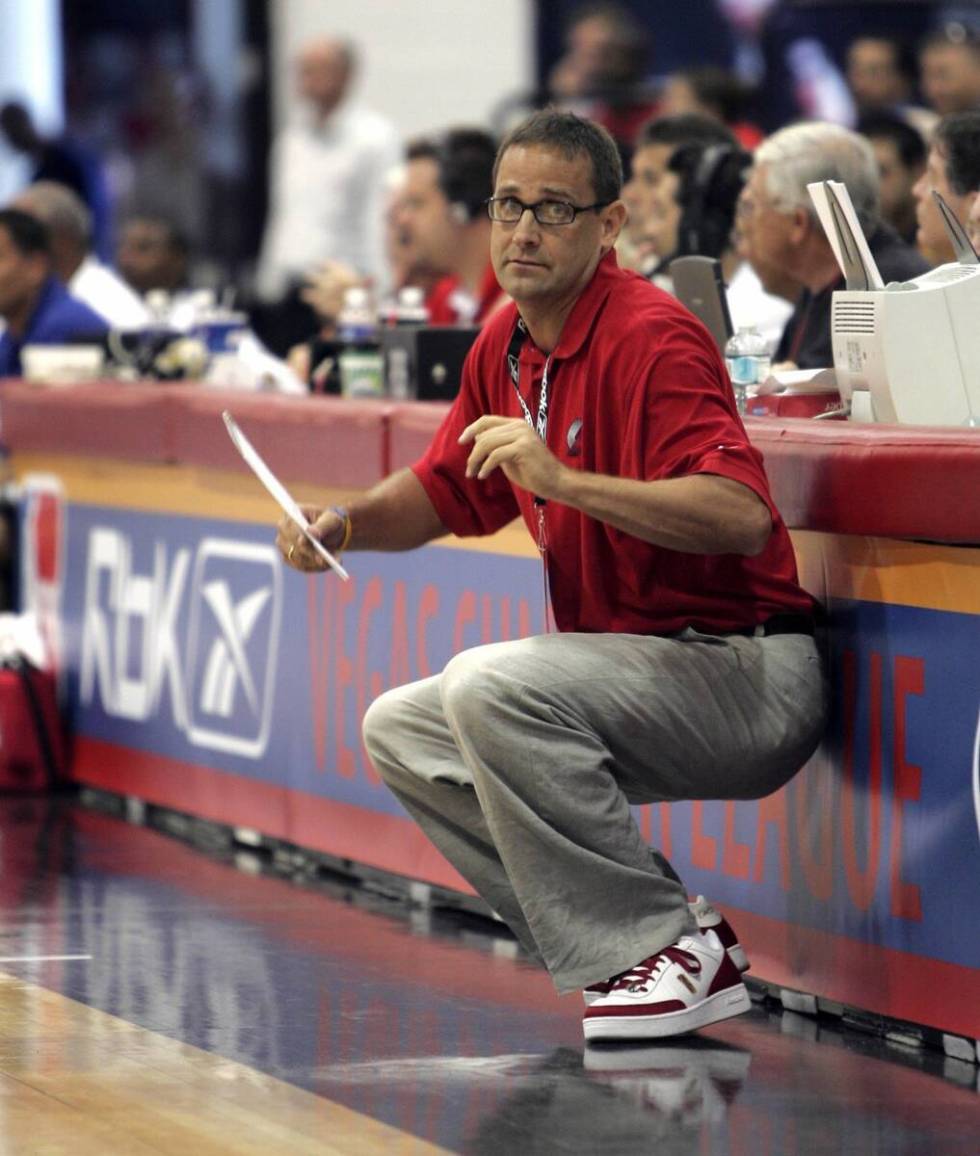 Former UNLV basketball coach Bill Bayno reacts as he watches his team play. photo John gurzins ...