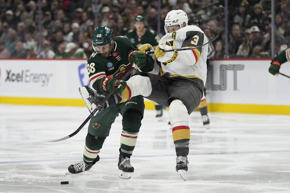 Minnesota Wild right wing Ryan Hartman (38) and Vegas Golden Knights defenseman Brayden McNabb ...