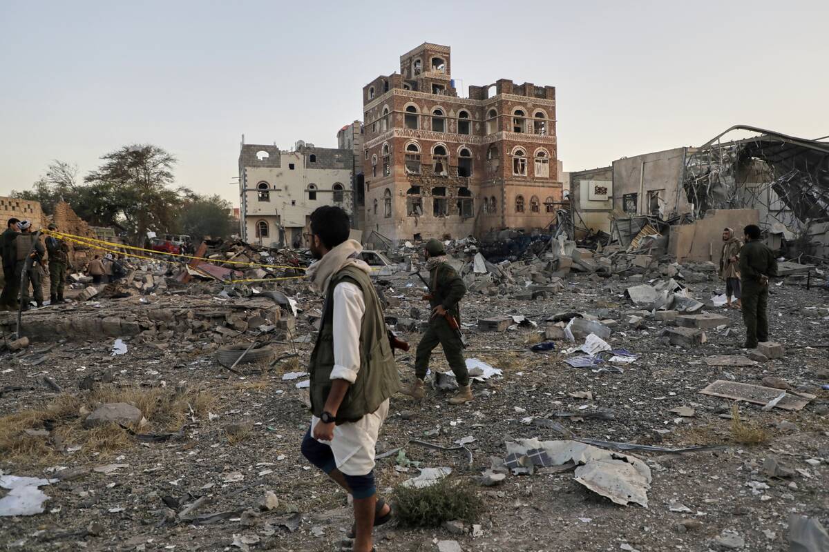 Locals inspect the site reportedly struck by U.S. airstrikes overnight in Sanaa, Yemen, Thursda ...