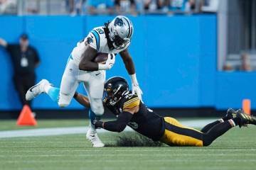 Carolina Panthers tight end Ian Thomas (80) is hit by Pittsburgh Steelers linebacker Miles Kill ...