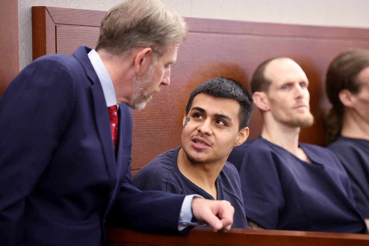 Jesus Ayala talks to his attorney, Chief Deputy Public Defender David Westbrook, in court at th ...