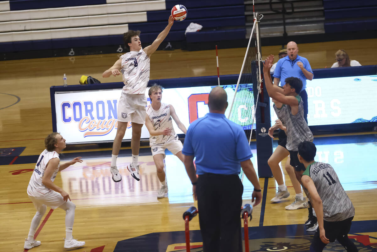 Coronado's Cameron Smith sends the ball over the net to Palo Verde during a high school volleyb ...