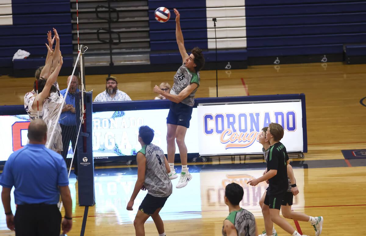 Palo Verde's Andrew Gutierrez (15) hits the ball during a high school volleyball game at Corona ...