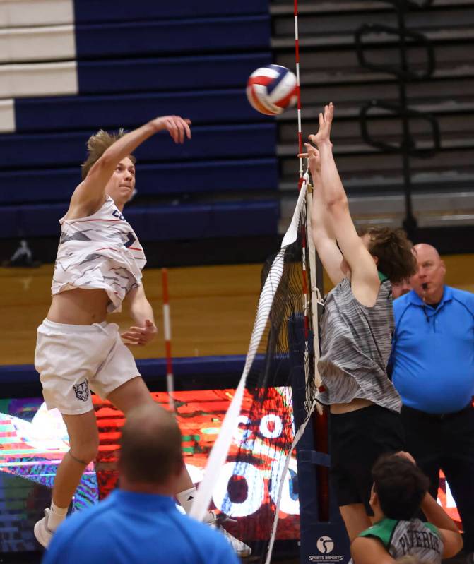 Coronado's Dane Galvin sends the ball past Palo Verde defense during a high school volleyball g ...