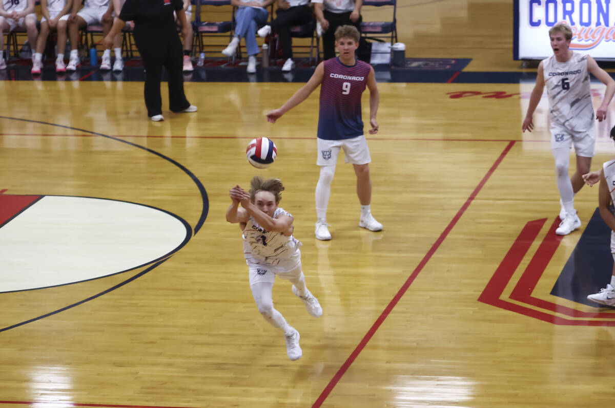 Coronado's Braxton Rowley (1) looks to make a save against Palo Verde during a high school voll ...