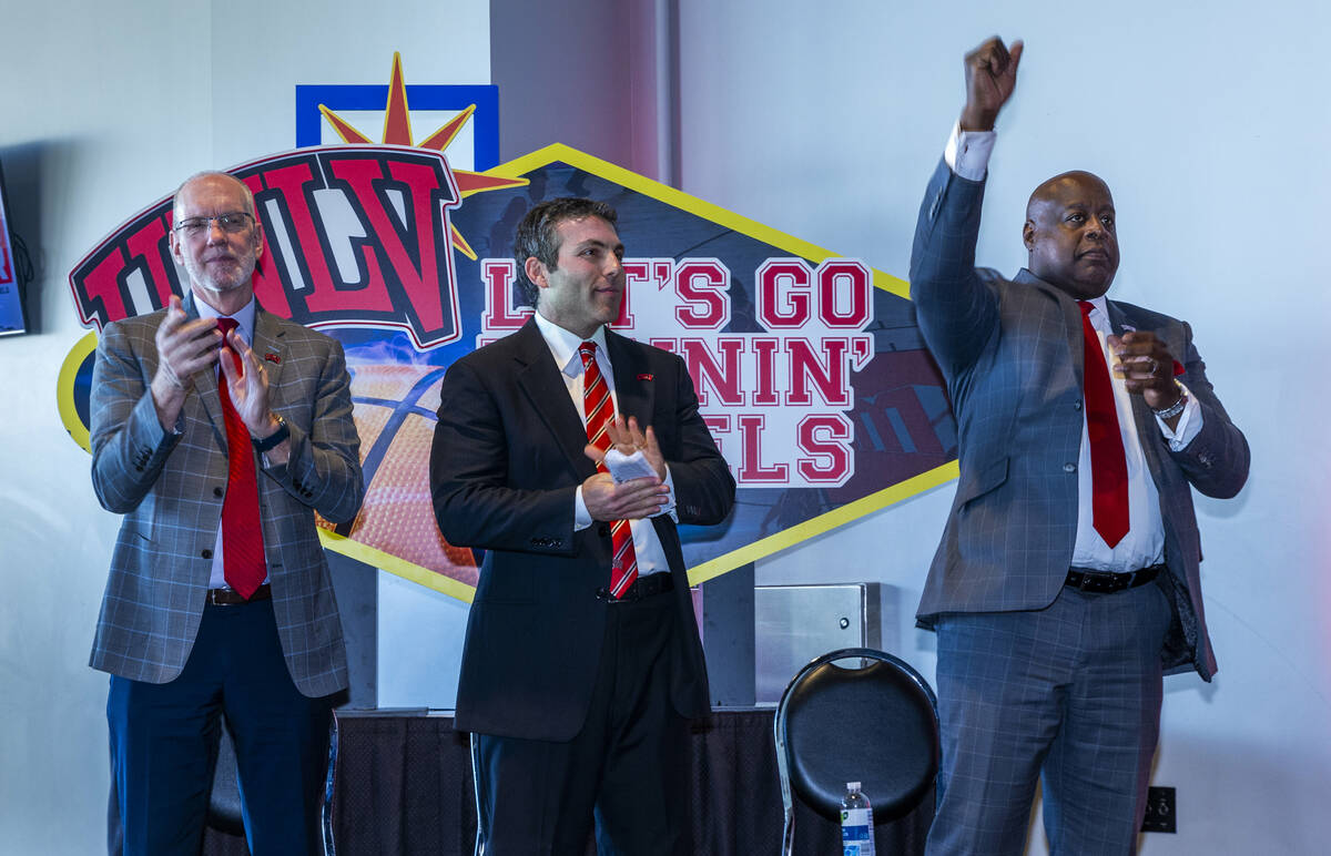 UNLV Officer in Charge Chris Heavey, new men's basketball coach Josh Pastner and Director of At ...