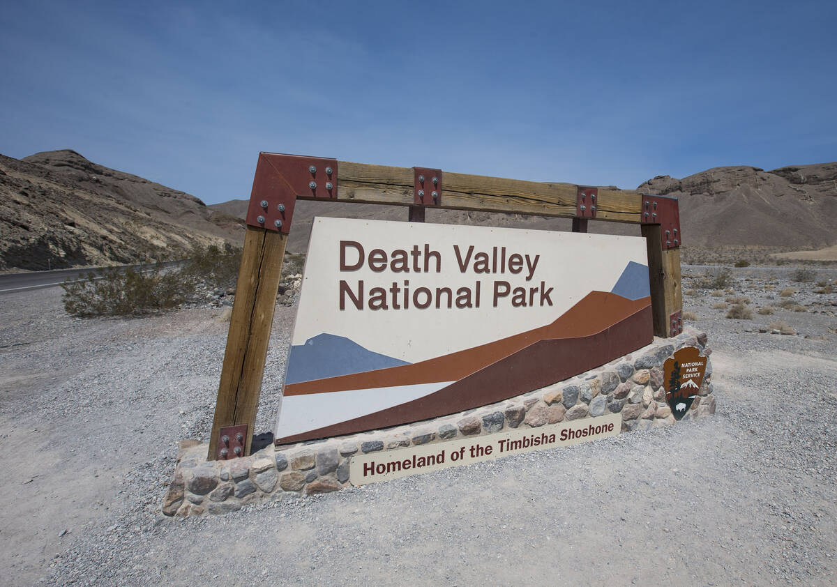 A sign marks the entrance to Death Valley National Park, Calif., on July 26, 2018. (Richard Bri ...