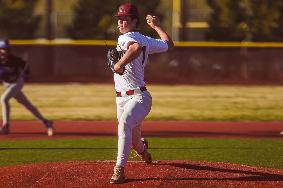 Faith Lutheran pitcher Cash Martin throws the ball during a high school baseball game between G ...