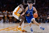 Kentucky guard Koby Brea (4) drives against Tennessee forward Felix Okpara (34) during the seco ...