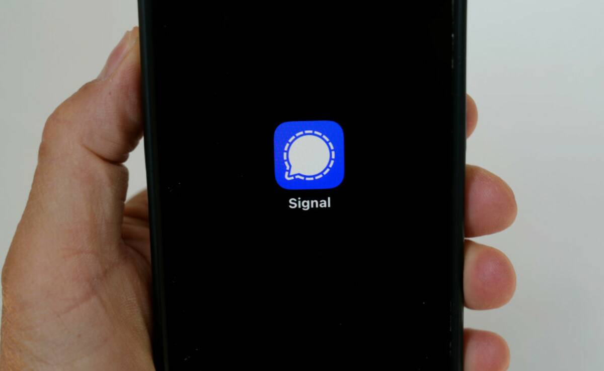 An image of the Signal app is shown on a mobile phone in San Francisco on March 18, 2025. (AP P ...
