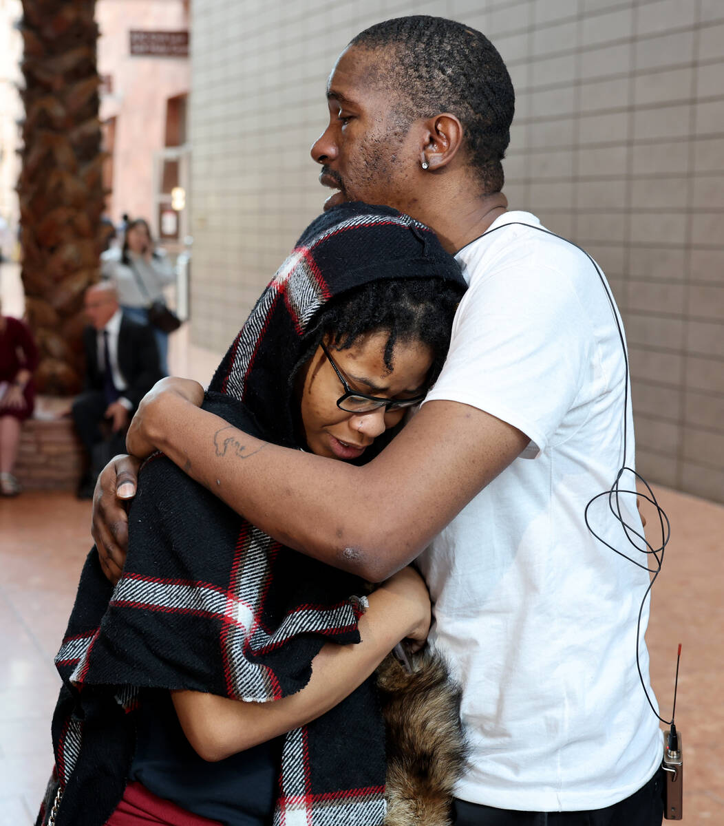 Phalan Whitson and Jeremy Ross, parents of 3-year-old Journei Ross, who police said was stabbed ...
